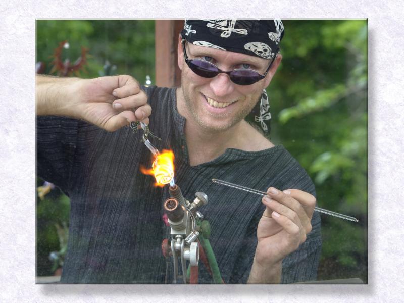 Glass Artisan At His Craft...